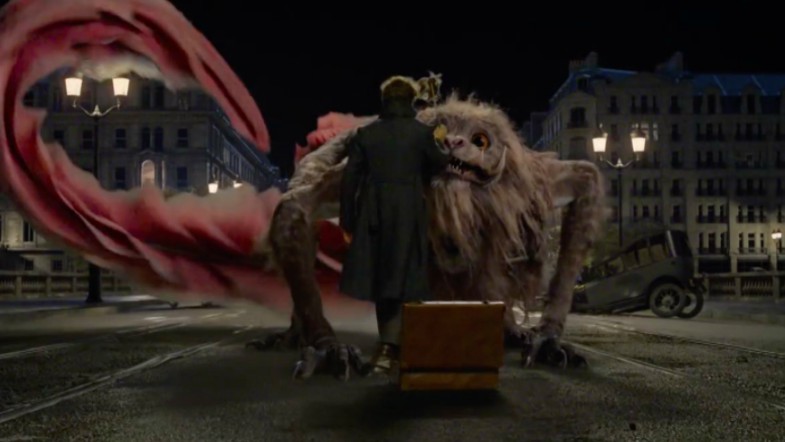 Newt Scamander facing off against the Zouwu.