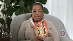 Oprah holding sun does shine book