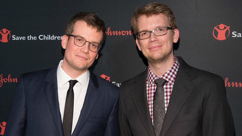 The Green Brothers smiling.