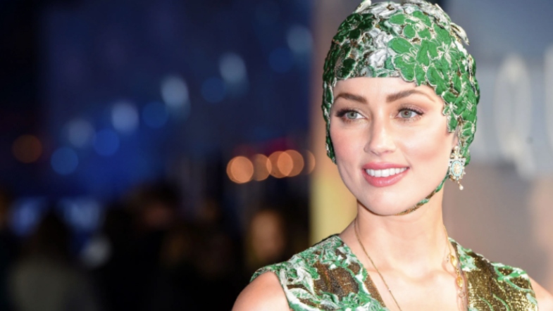‘Aquaman’ Star Amber Heard Had a Special Way of Hiding Books on Set