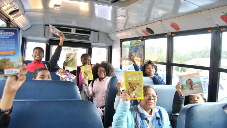 ‘Books on the Bus’ Program Helps Students Read More On The Way Home!