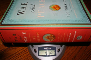 Leo Tolstoy's 'War and Peace' sitting on a scale