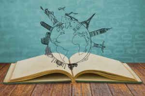 An open book with a globe coming out of it