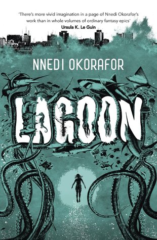The cover to Lagoon, featuring a young woman surrounded by aquatic life under the sea