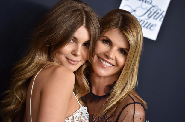 Lori Loughlin and her daughter, Olivia Jade standing side by side smiling for the camera