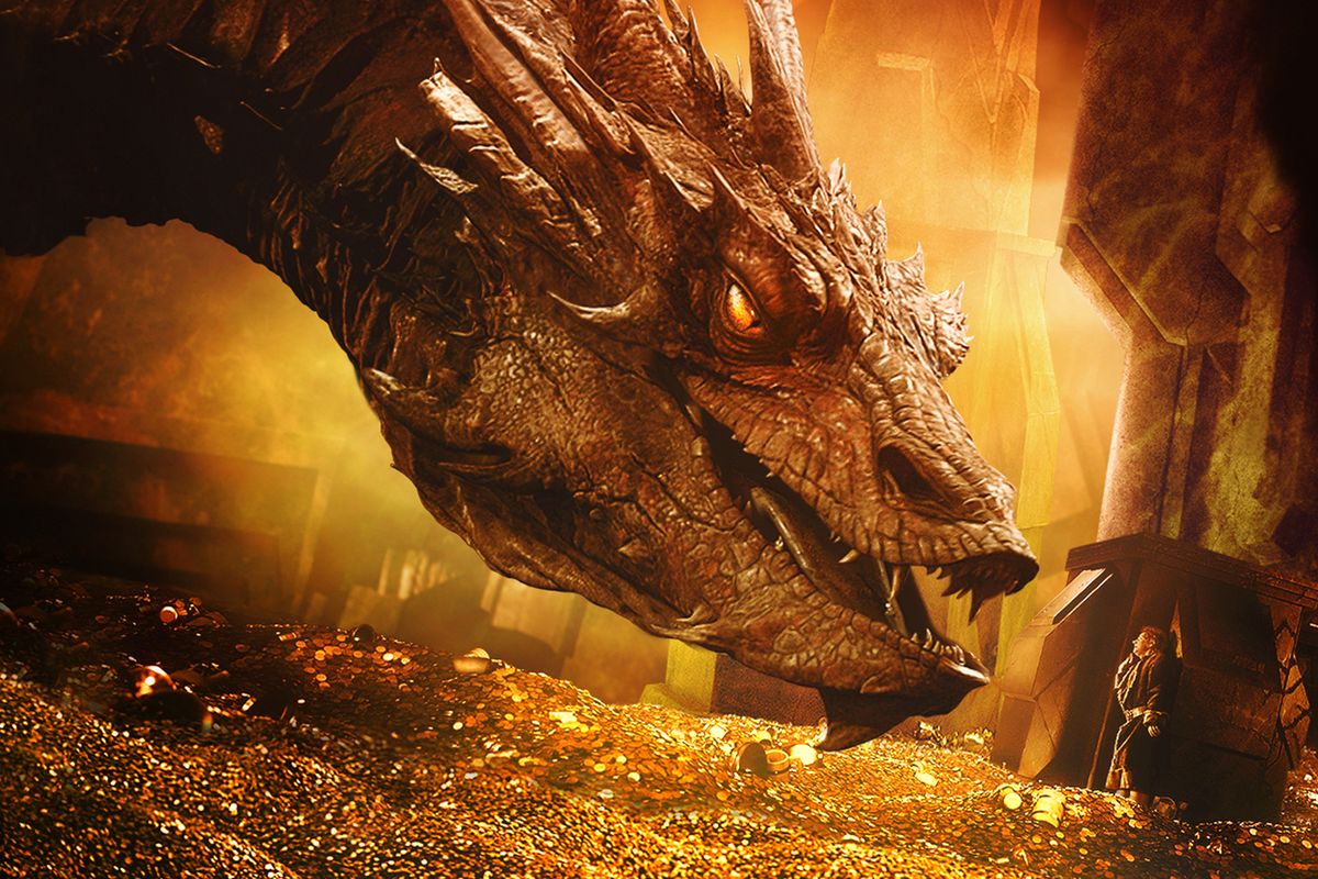 Smaug the dragon towers over Bilbo Baggins (Martin Freeman) atop his hoard of treasure in the Hobbit's film adaptation
