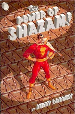 The Power of Shazam shows Shazam standing, hands on hips on bricks with lightening bolts on them