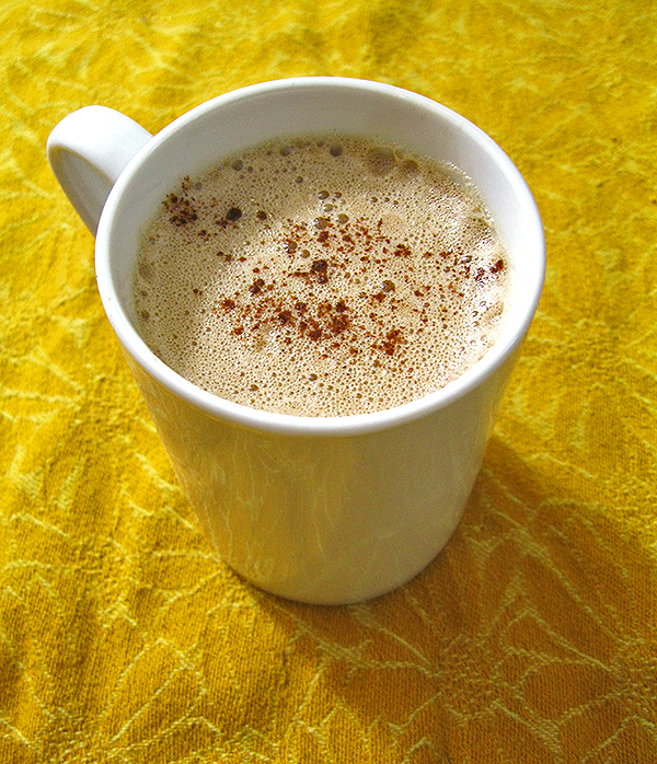 A hot steaming coffee mug