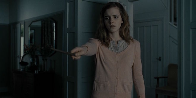 Hermione prepares to erase her parent's memories with a spell