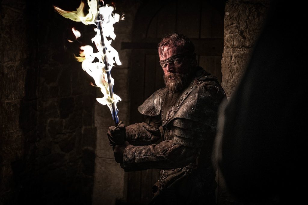 Bedric wields a flaming sword in the crypt of Winterfell