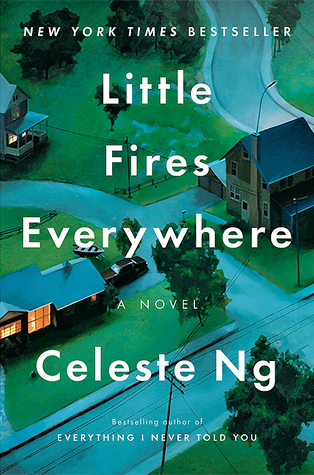 A suburb bathed in darkness, with one light on in a house