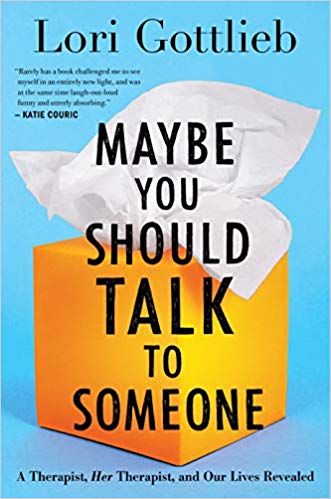 The cover to a self help book with a box of Kleenex 