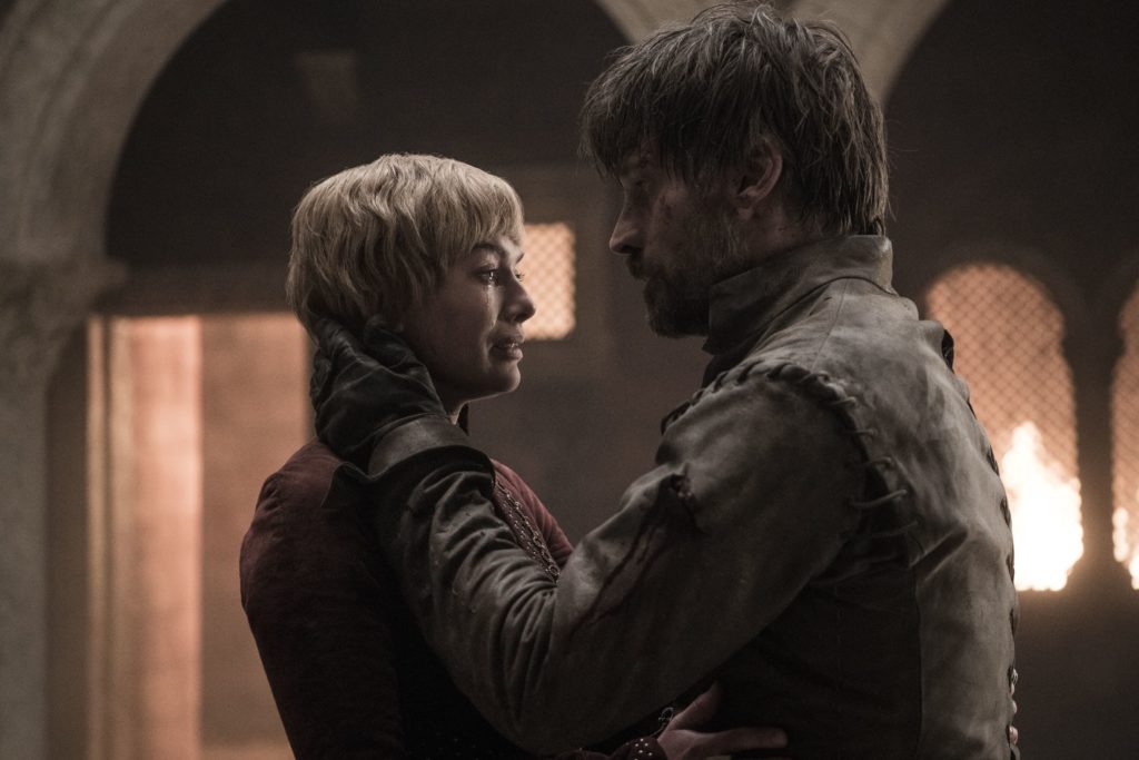 Cersei and Jamie embrace in the burning ruins of King's Landing