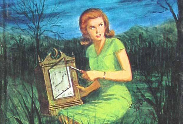 Nancy Drew, clad in a green dress sits in a swamp as she attempts to open a clock