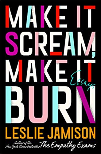 A bunch of neon letters saying 'Make It Scream Make it burn'