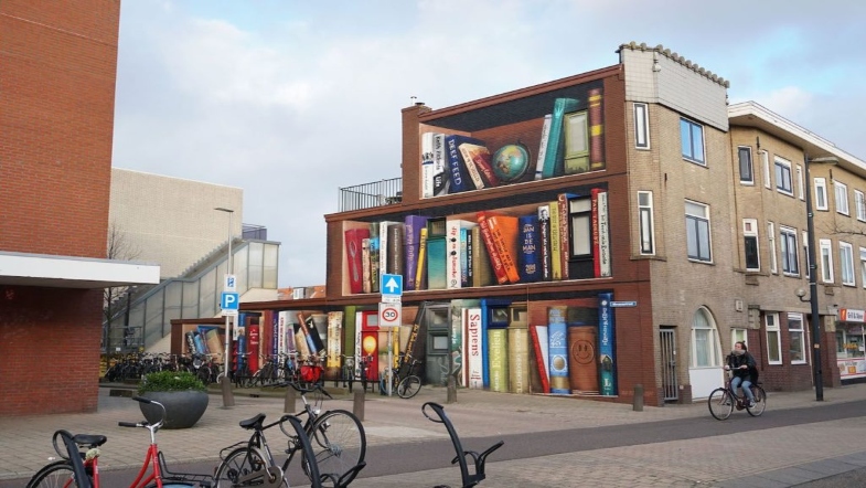 Building Turned Into Jaw-Dropping Bookcase Illusion