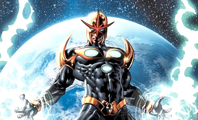 The superhero Nova crackling with energy as he stands before a planet in space