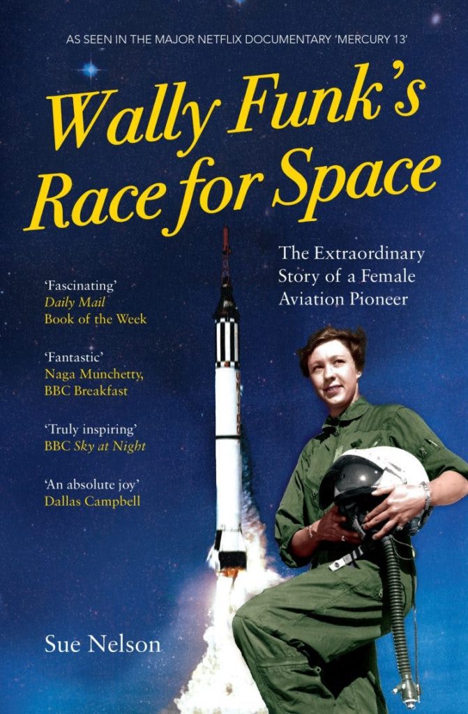 A woman holding a space helmet stands before a rocket ship taking off 