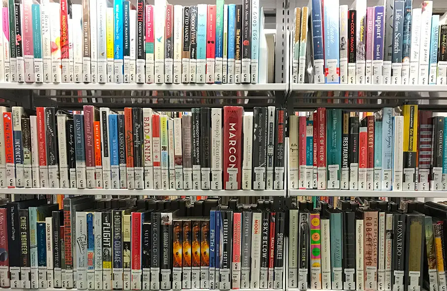 Book and movies on library shelves