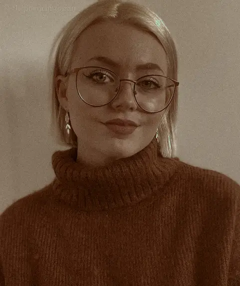 Portrait image of a woman with glases